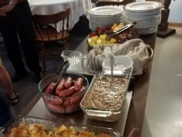 Buffet of casseroles and foods on table