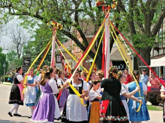 Maypole dancers in period dress at Maifest