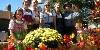 People in costume celebrating Oktoberfest